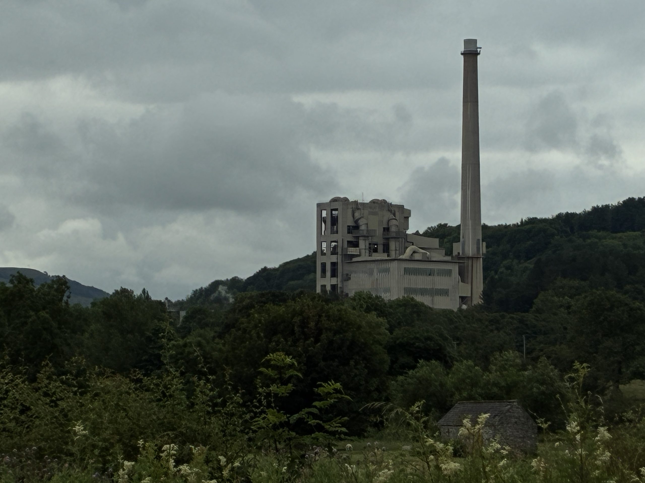 Explore the Dark Peak – Hope Cement Works set against the dramatic landscape of the Hope Valley in the Peak District.